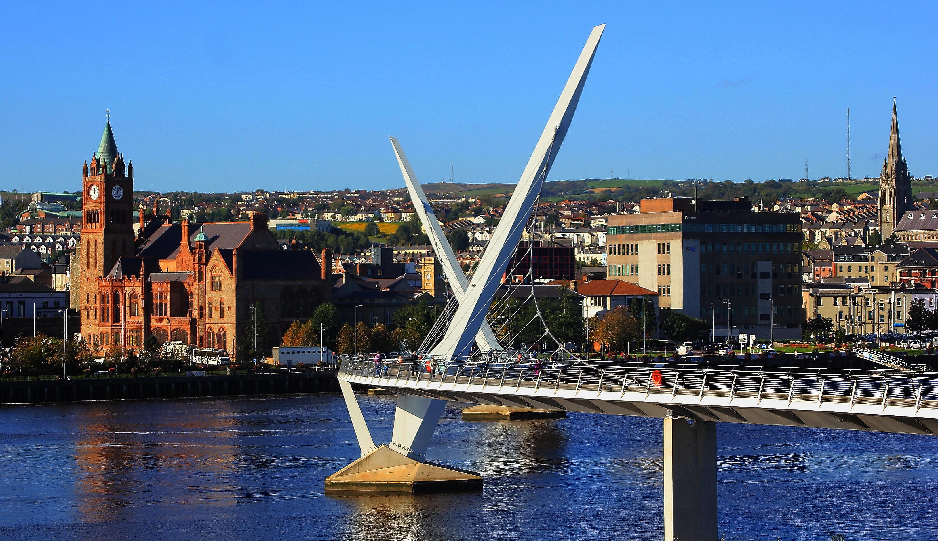 The Peace Bridge in Derry-Londonderry, with the Guildhall in the background.