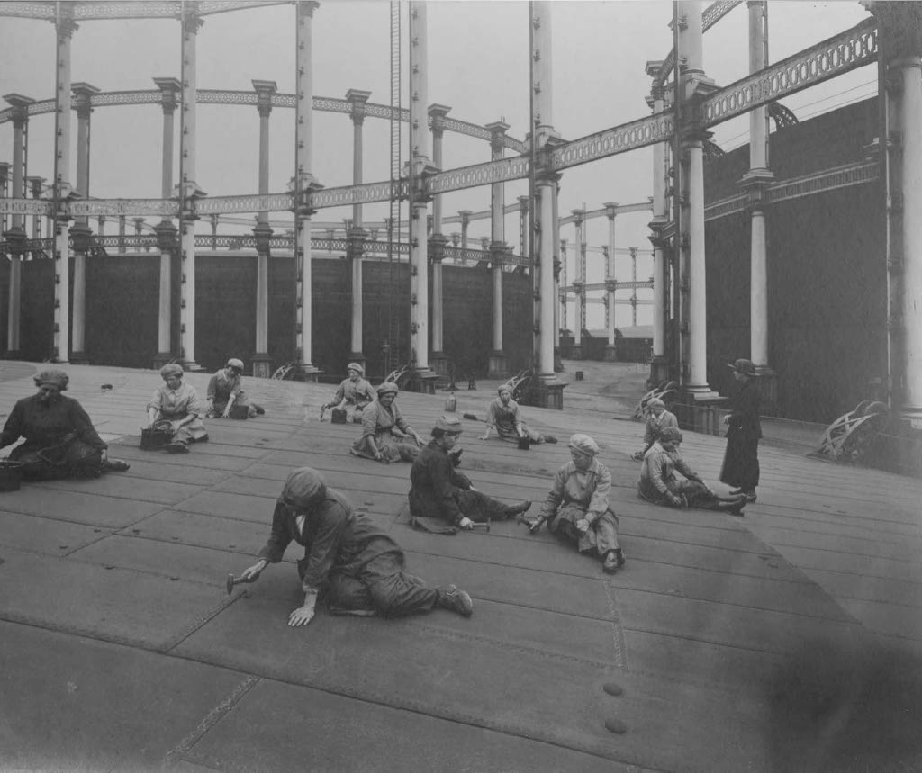 Women working on the roof of a gas holder during WWI.