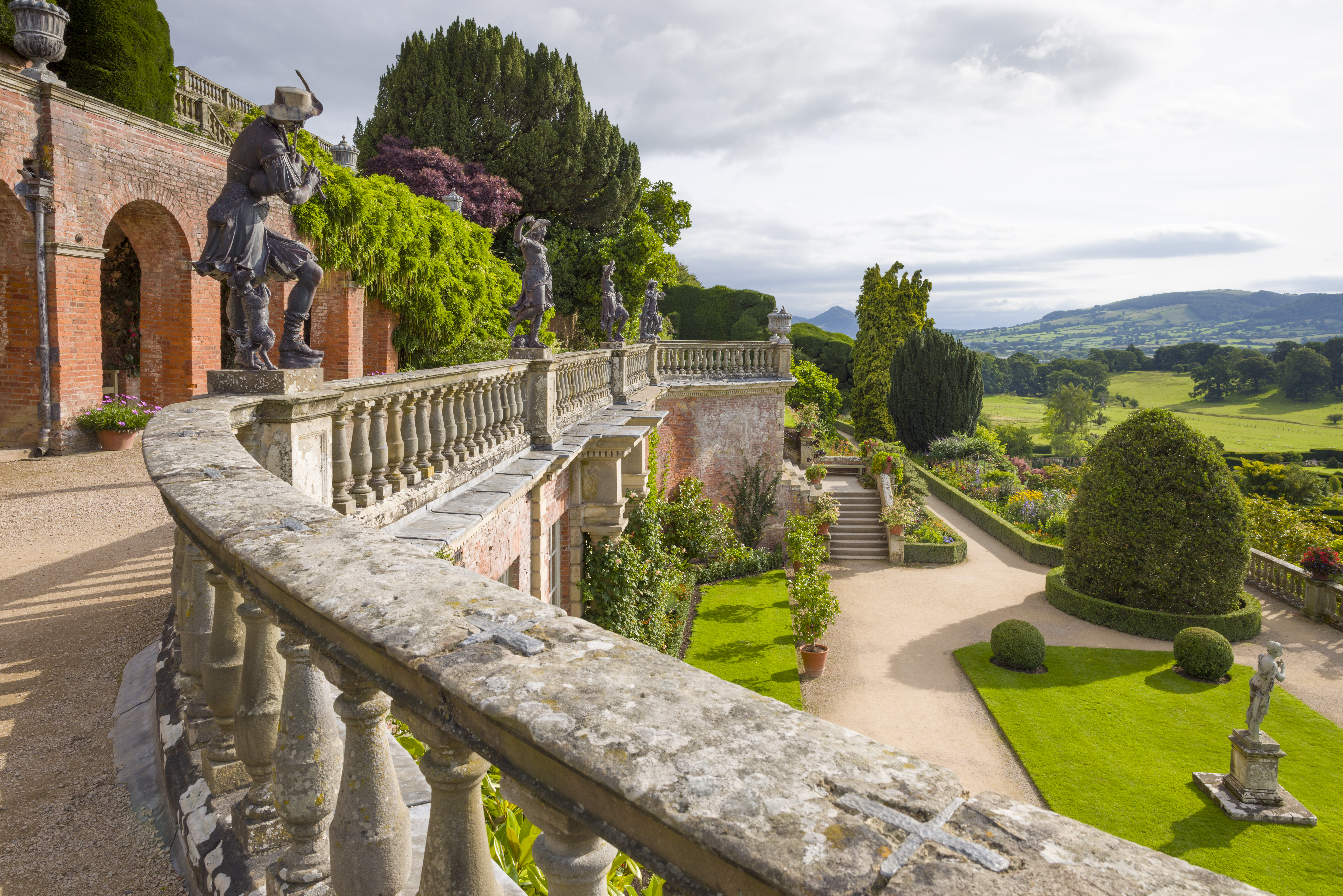 The formal gardens at Powis Castle, featuring lead statues.